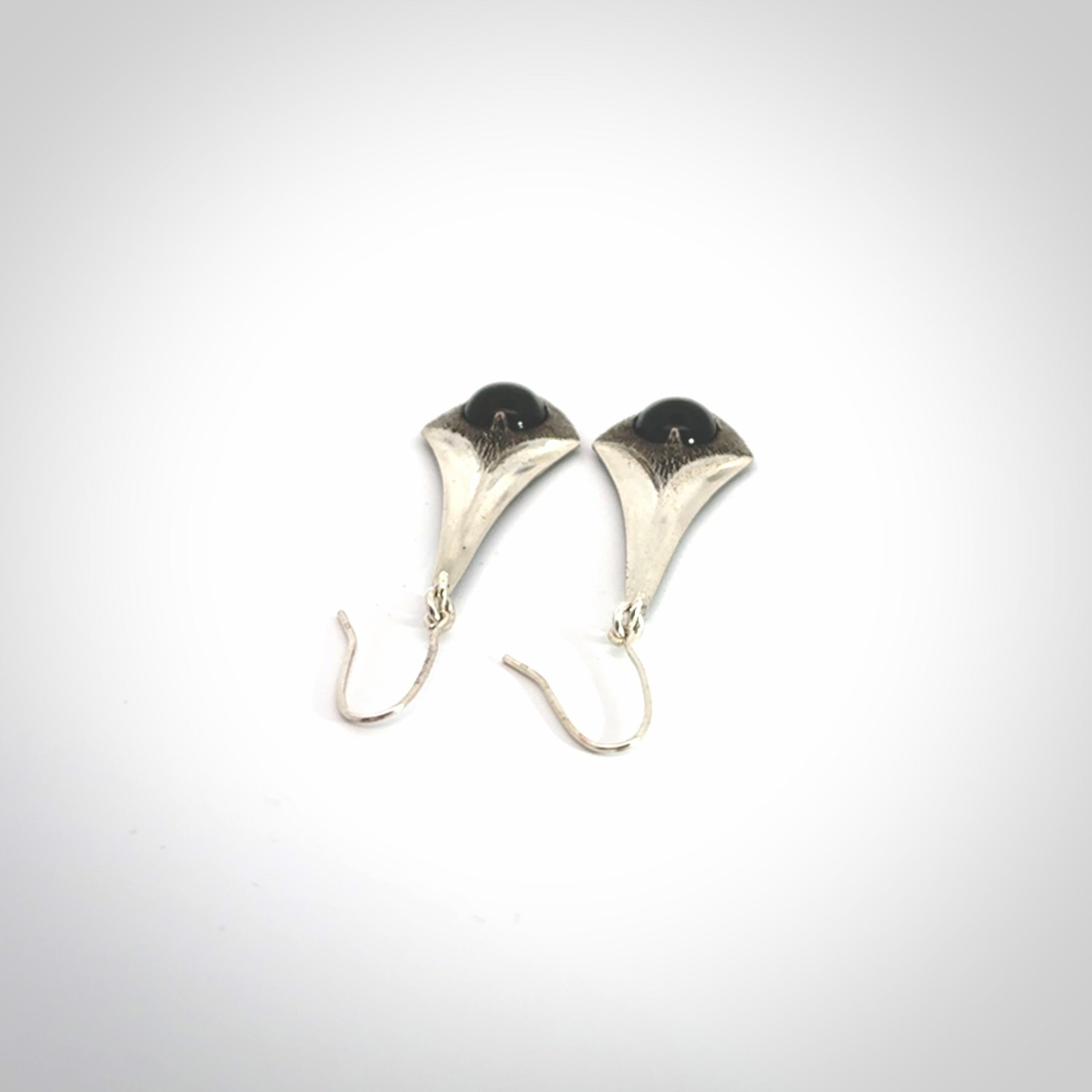 These are hand carved Sterling Silver lantern earrings with New Zealand Jade insert.