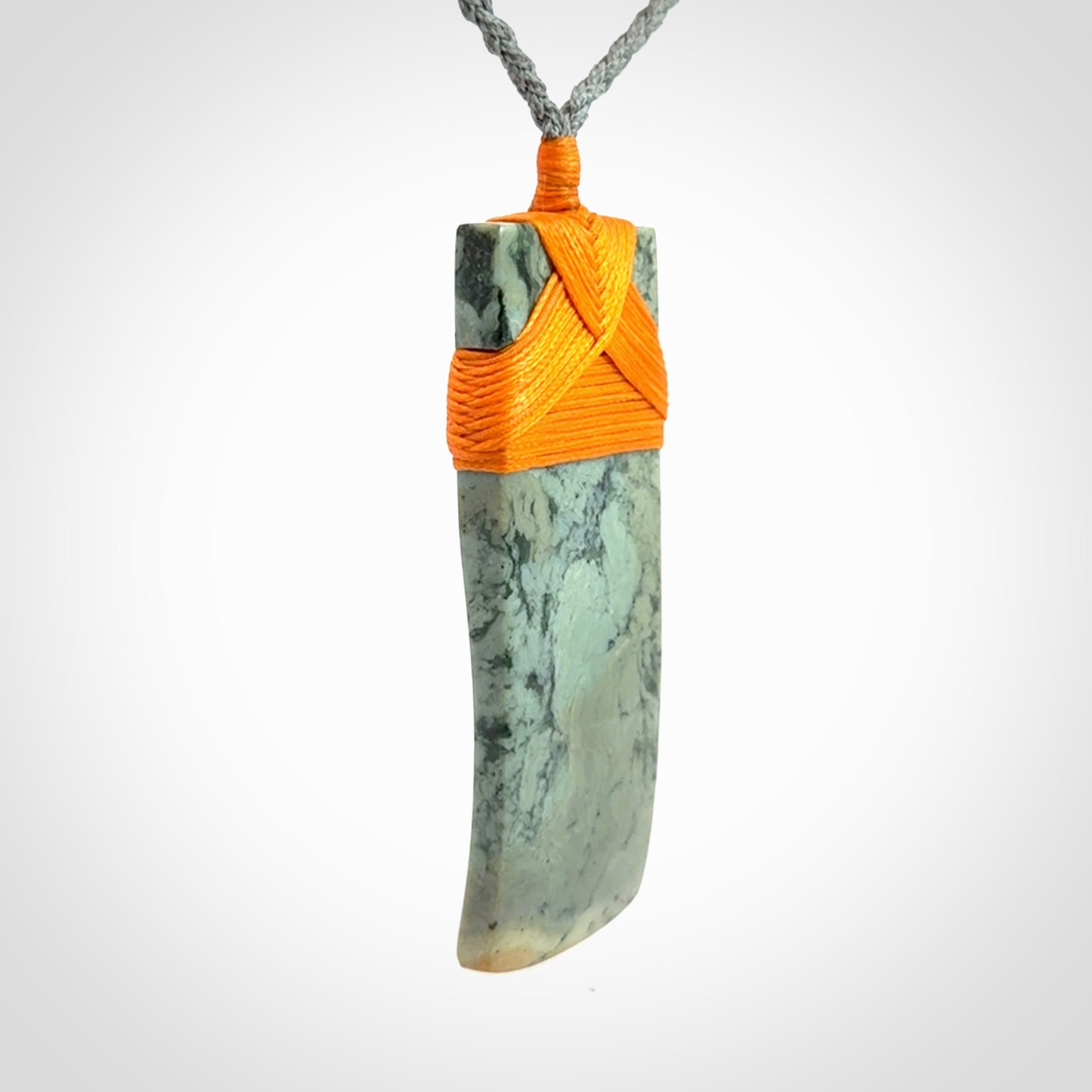 A Striking Jade Toki Pendant