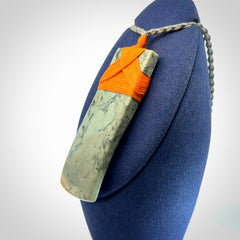 A Striking Jade Toki Pendant