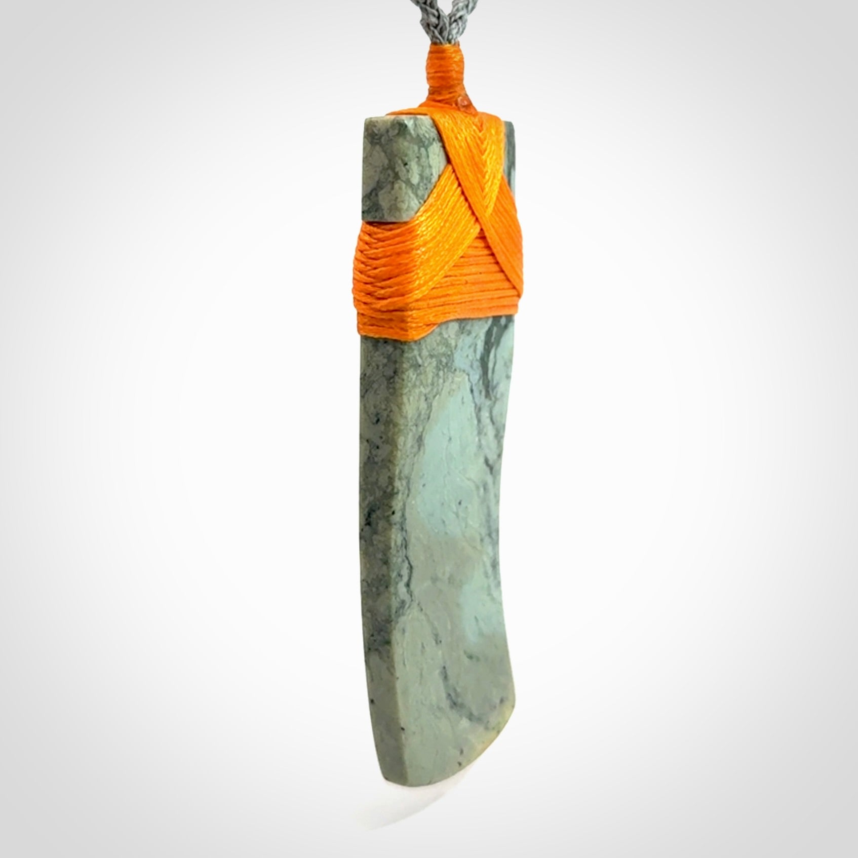 A Striking Jade Toki Pendant