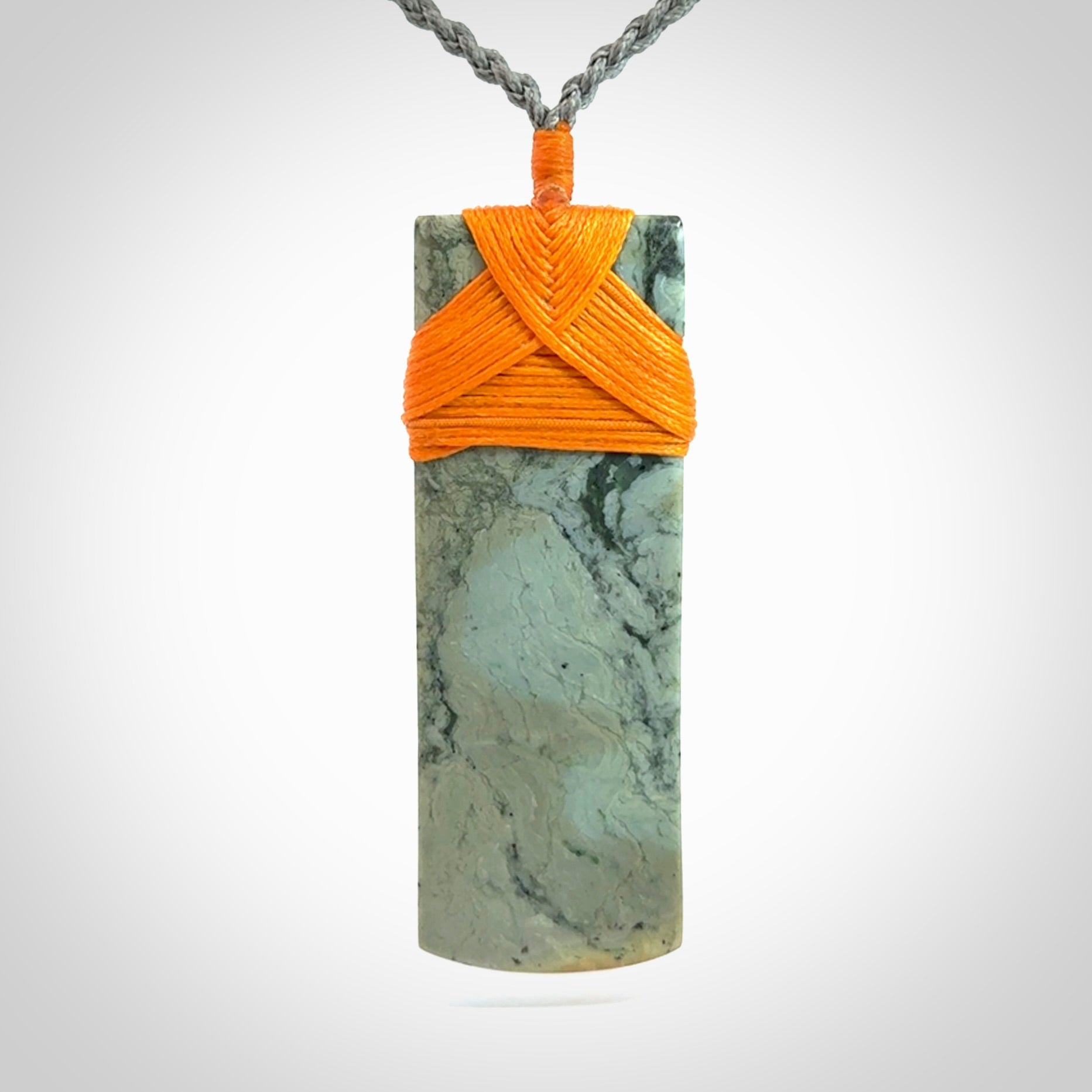 A Striking Jade Toki Pendant