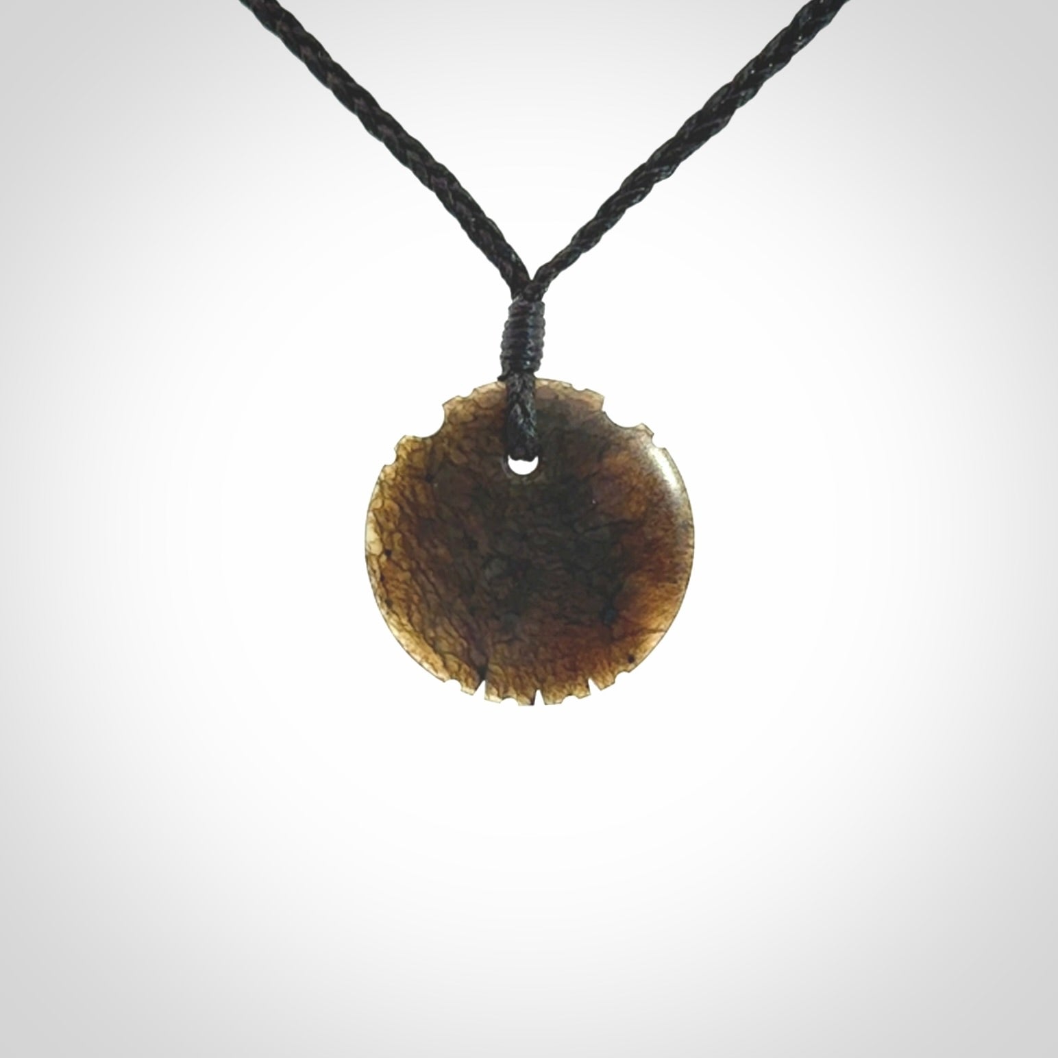 Subtle yet Striking Art to Wear! Hand carved New Zealand Jade pendant