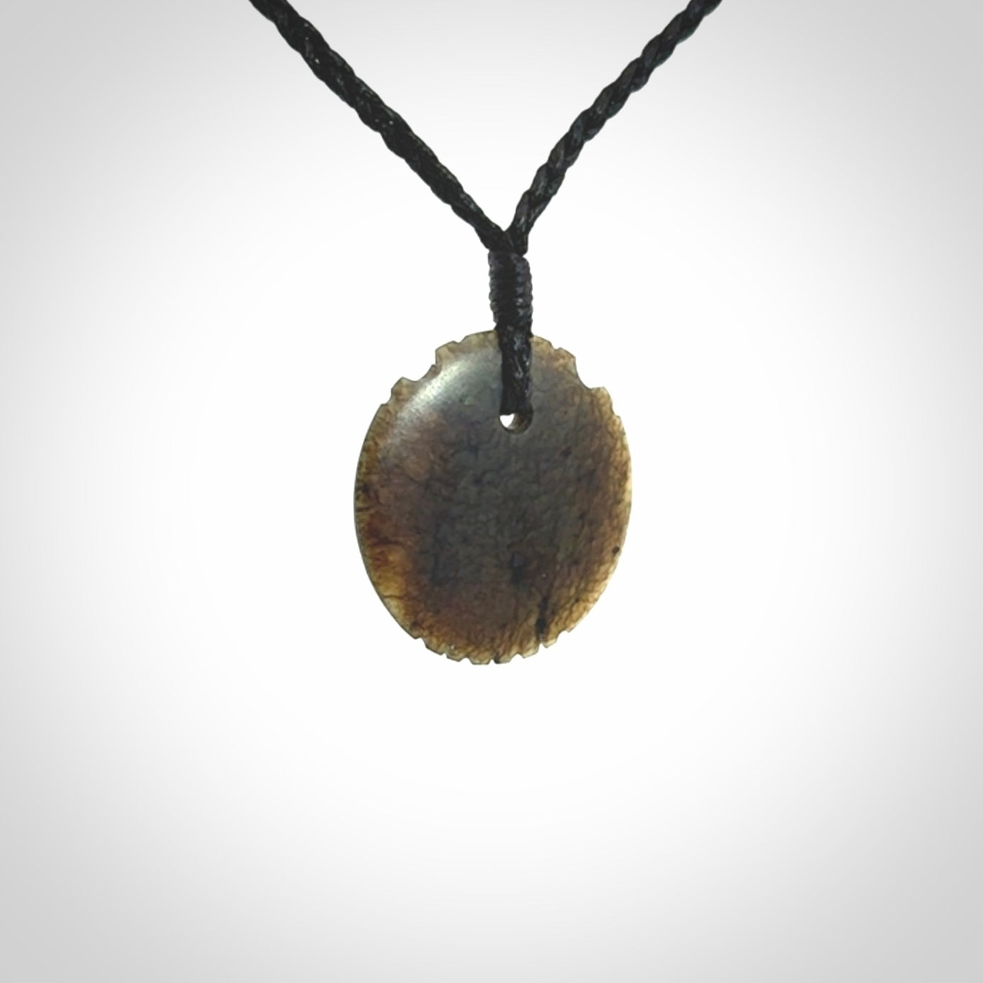 Subtle yet Striking Art to Wear! Hand carved New Zealand Jade pendant