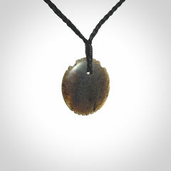 Subtle yet Striking Art to Wear! Hand carved New Zealand Jade pendant
