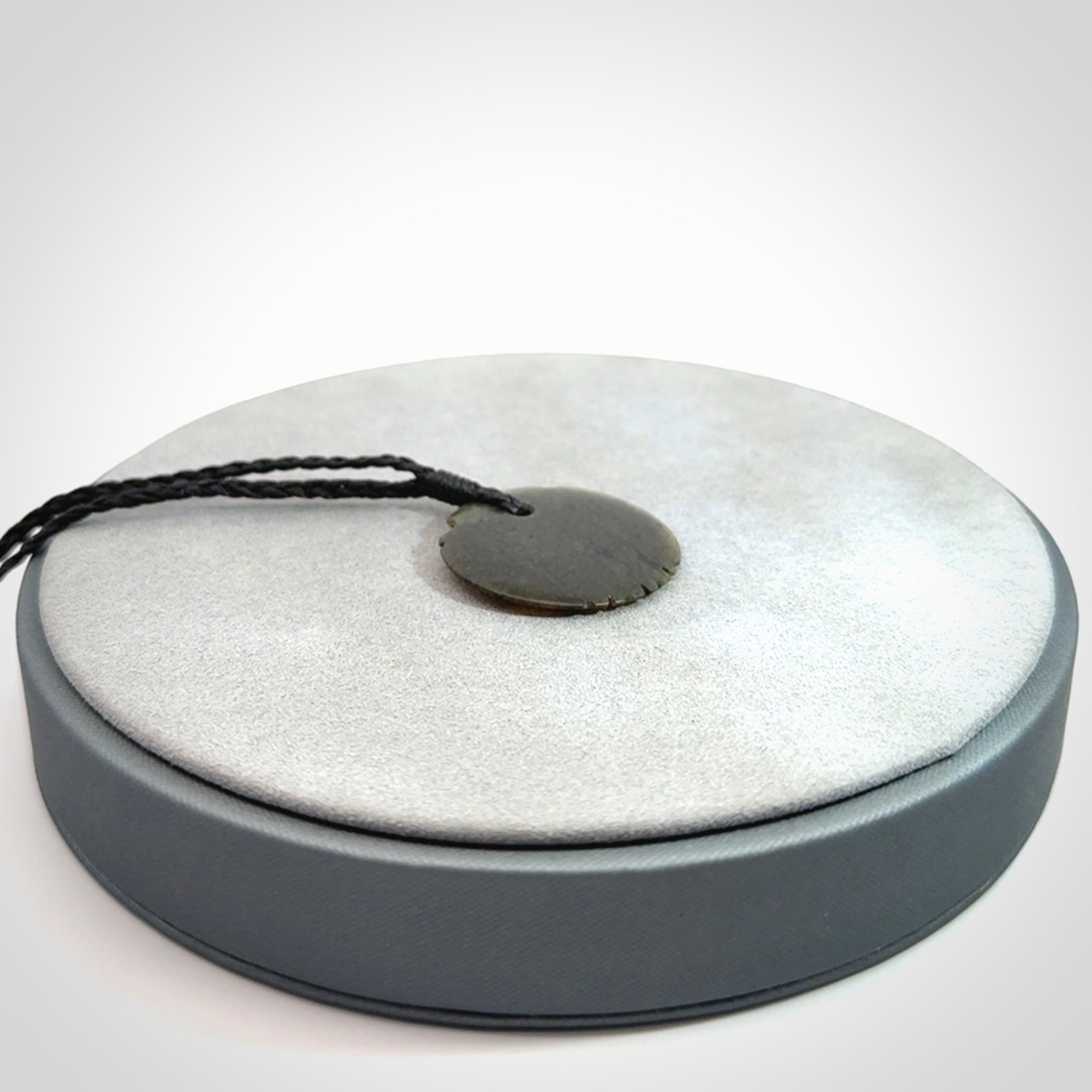 Subtle yet Striking Art to Wear! Hand carved New Zealand Jade pendant