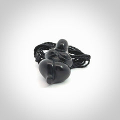 Black jade goddess pendant. Hand carved by NZ Pacific. Black Jade jewellery for sale online. Midnight Goddess is provided on a black adjustable cord and packaged in a woven kete pouch.
