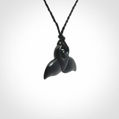 Hand carved Australian Black Jade whale tail pendant. Small whale tail necklace with adjustable cord.
