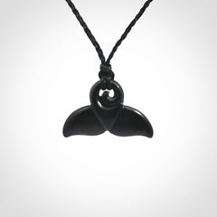 Hand carved Australian Black Jade whale tail pendant. Small whale tail necklace with adjustable cord.
