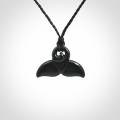 Hand carved Australian Black Jade whale tail pendant. Small whale tail necklace with adjustable cord.