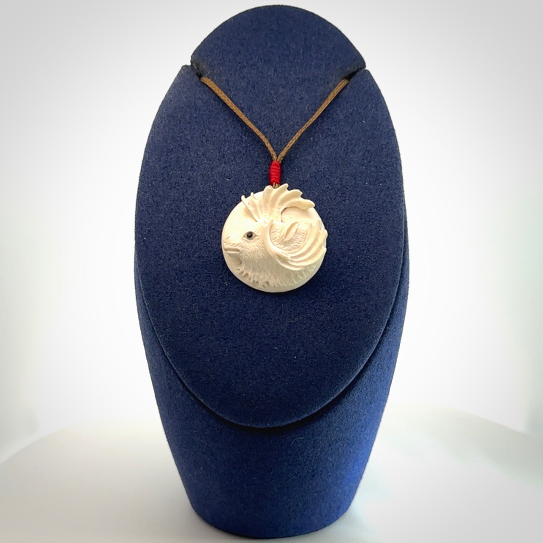 Hand carved Moose pendant in Woolly Mammoth Tusk