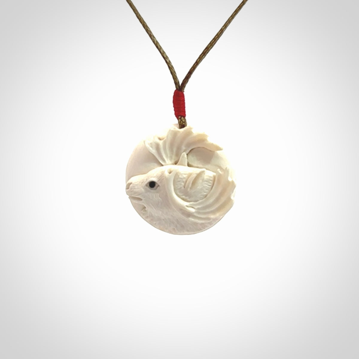 Hand carved Moose pendant in Woolly Mammoth Tusk