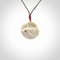 Hand carved Moose pendant in Woolly Mammoth Tusk