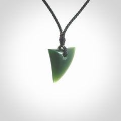 Hand carved pounamu niho, drop pendant. Jade necklace hand made in New Zealand.
