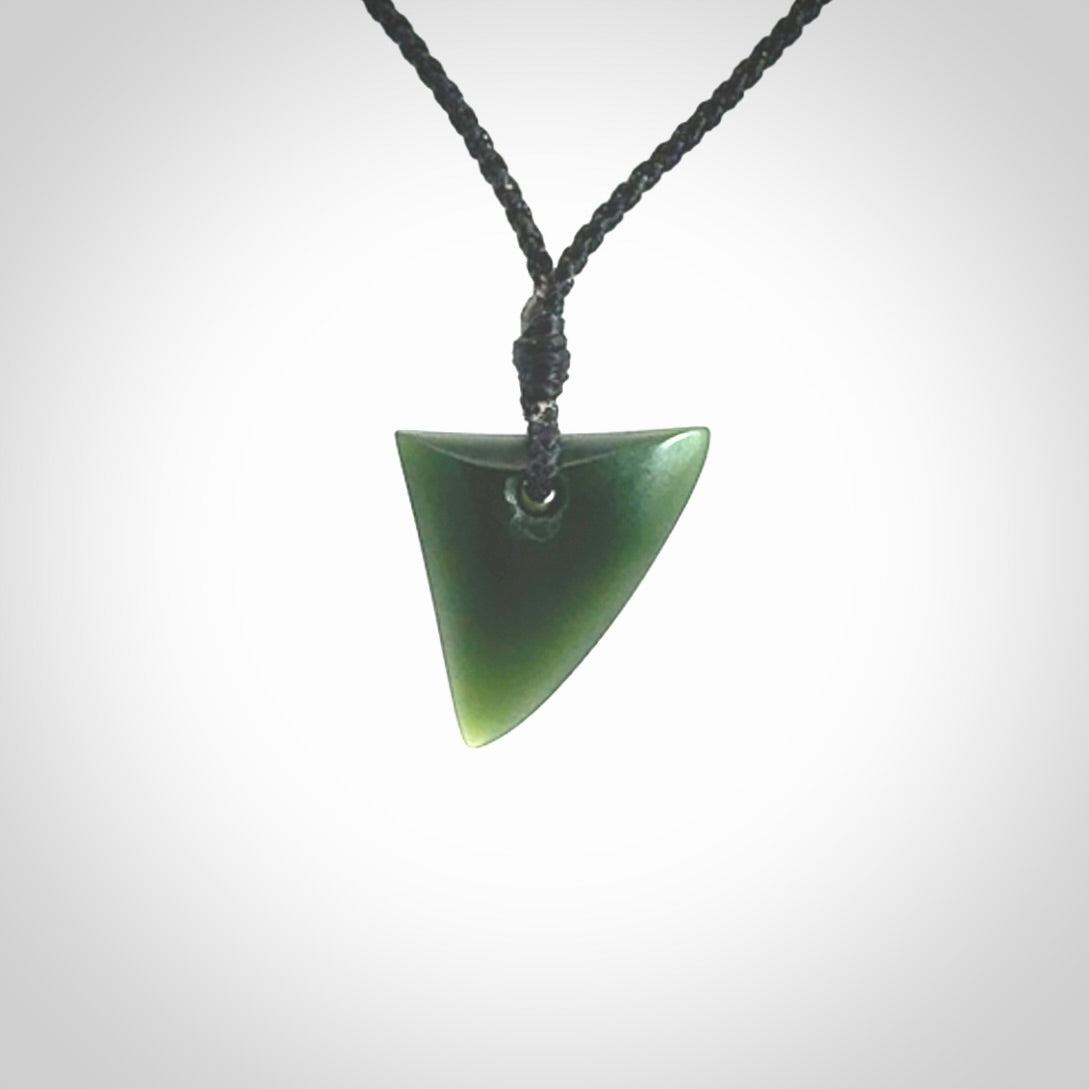 Hand carved pounamu niho, drop pendant. Jade necklace hand made in New Zealand.