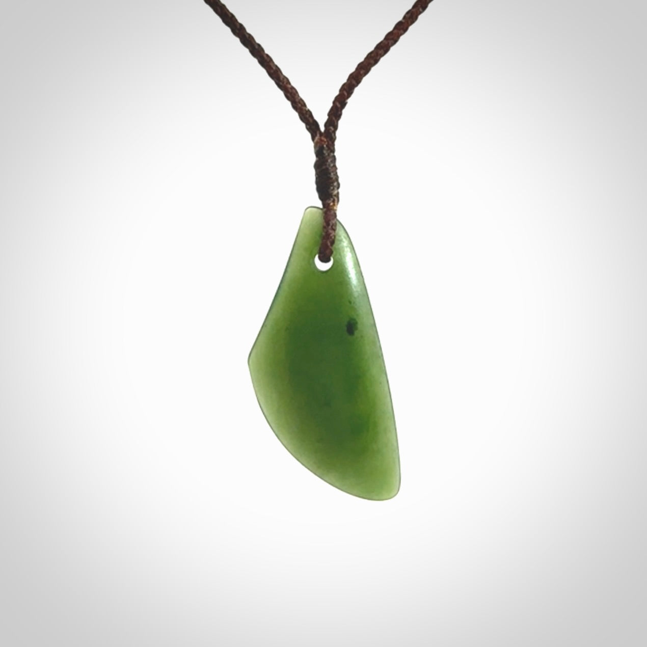 Hand carved pounamu drop pendant. Jade necklace hand made in New Zealand.