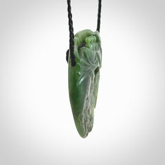 A beautiful hand carved, New Zealand Jade waka pendant.