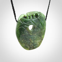 A beautiful hand carved, New Zealand Jade waka pendant.