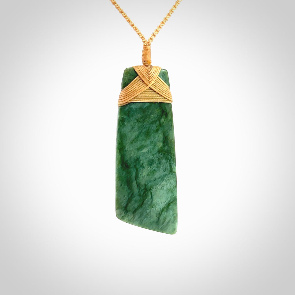 HAND CARVED NEW ZEALAND JADE TOKI PENDANT. NZ JADE TOKI NECKLACE. NZ