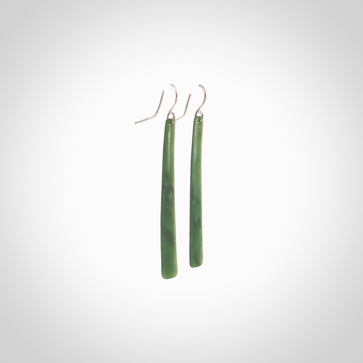 Hand carved large New Zealand jade drop earrings. Made by NZ Pacific from real jade. Online jewellery for sale online by NZ Pacific. Hand carved here in New Zealand by Ric Moor.