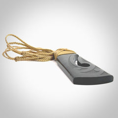 Hand made large New Zealand Argillite toki with hook pendant. Hand carved in New Zealand by Rueben Tipene. Hand made jewellery. Unique large Argillite Stone Toki and hook pendant with adjustable cord. Free shipping worldwide.