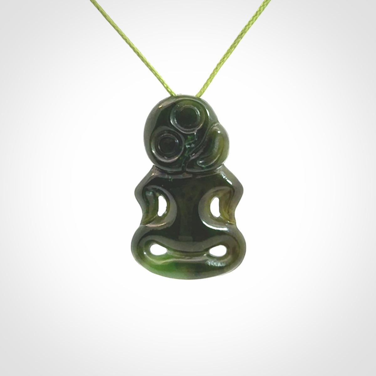 This pendant is a small jade tiki pendant. The carving shows wonderful detail on the front while the back is beautifully rounded. These are carved in Columbian Jade. The cord is adjustable in length. Provided in a woven kete pouch and shipped worldwide.