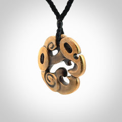 A beautiful hand made, bronze manaia pendant.