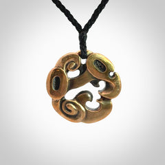 A beautiful hand made, bronze manaia pendant.