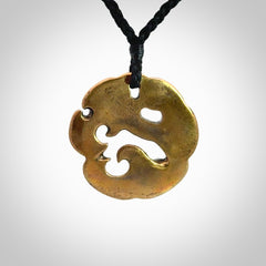 A beautiful hand made, bronze manaia pendant.