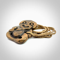 A beautiful hand made, bronze tiki pendant.