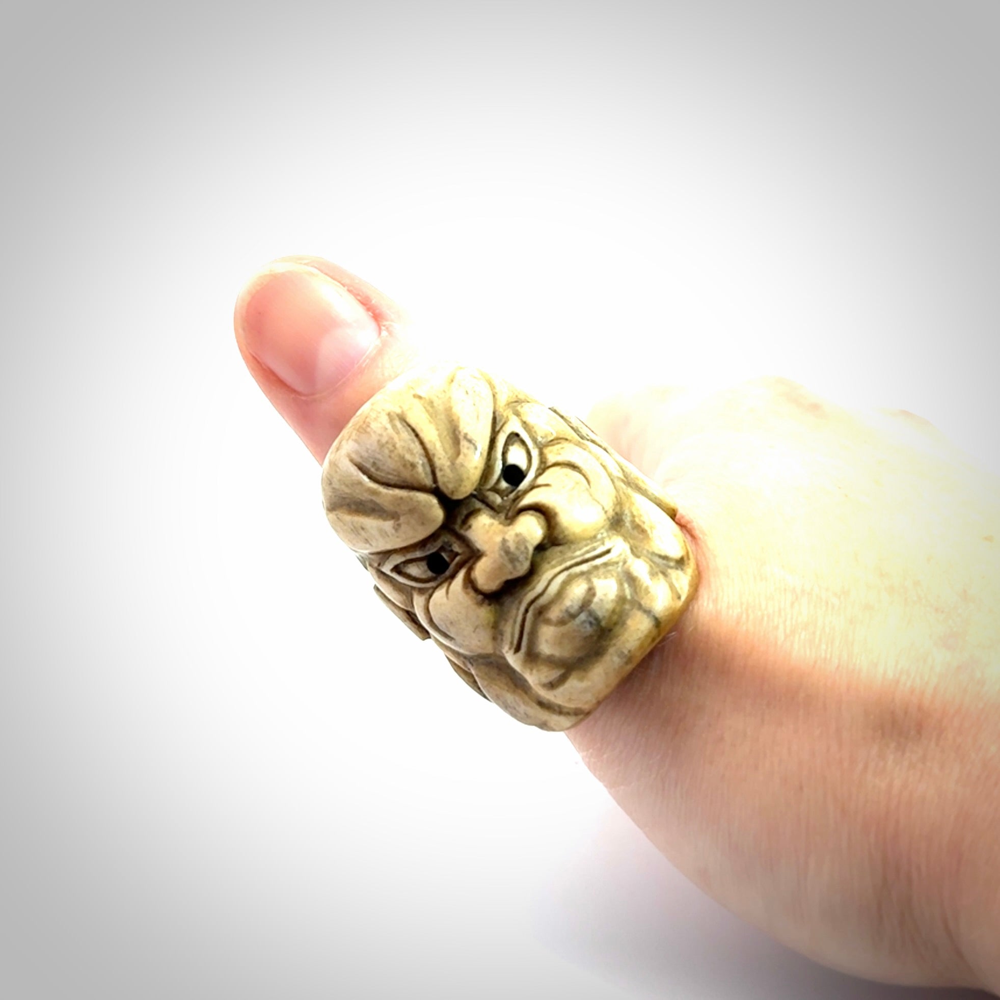 Hand carved Ni-Oh mask ring. Made from Red Deer antler in New Zealand. Unique Ni-Oh temple guardian ring hand made from deer antler by master bone carver Fumio Noguchi. Spectacular collectable work of art, made to wear. One only ring, delivered to you with express courier.