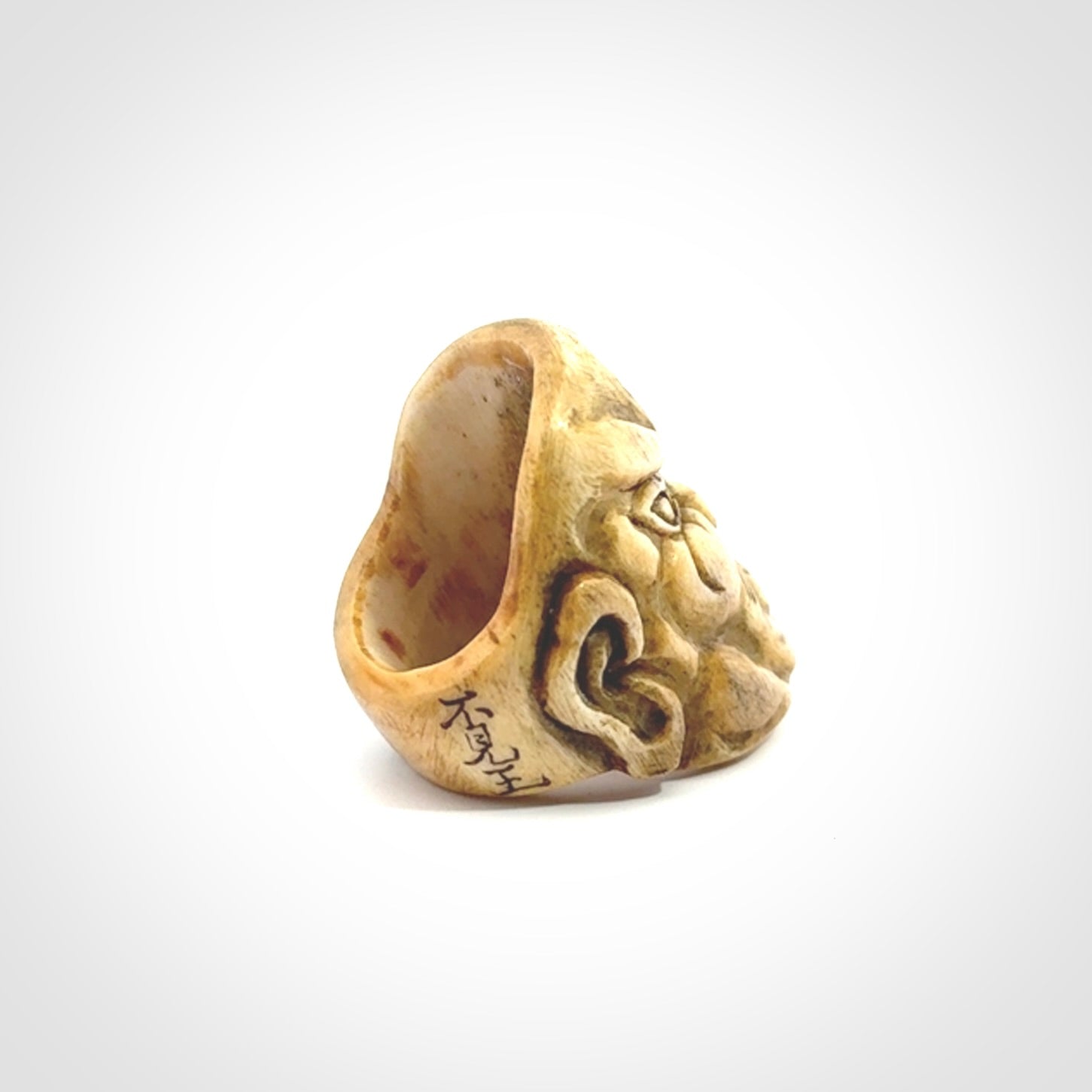 Hand carved Ni-Oh mask ring. Made from Red Deer antler in New Zealand. Unique Ni-Oh temple guardian ring hand made from deer antler by master bone carver Fumio Noguchi. Spectacular collectable work of art, made to wear. One only ring, delivered to you with express courier.