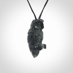 A traditional Owl design carving, hand made for us from Australian Black Jade. This is a work of art and is a collectable piece of traditional Black Jade carving. It can be worn as a special piece of jewellery or displayed. This is art made to wear at its finest. A unisex pendant for owl lovers. This pendant is provided with an adjustable cord.