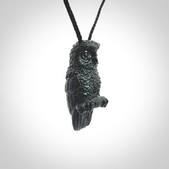 A traditional Owl design carving, hand made for us from Australian Black Jade. This is a work of art and is a collectable piece of traditional Black Jade carving. It can be worn as a special piece of jewellery or displayed. This is art made to wear at its finest. A unisex pendant for owl lovers. This pendant is provided with an adjustable cord.