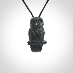 A traditional Owl design carving, hand made for us from Australian Black Jade. This is a work of art and is a collectable piece of traditional Black Jade carving. It can be worn as a special piece of jewellery or displayed. This is art made to wear at its finest. A unisex pendant for owl lovers. This pendant is provided with an adjustable cord.