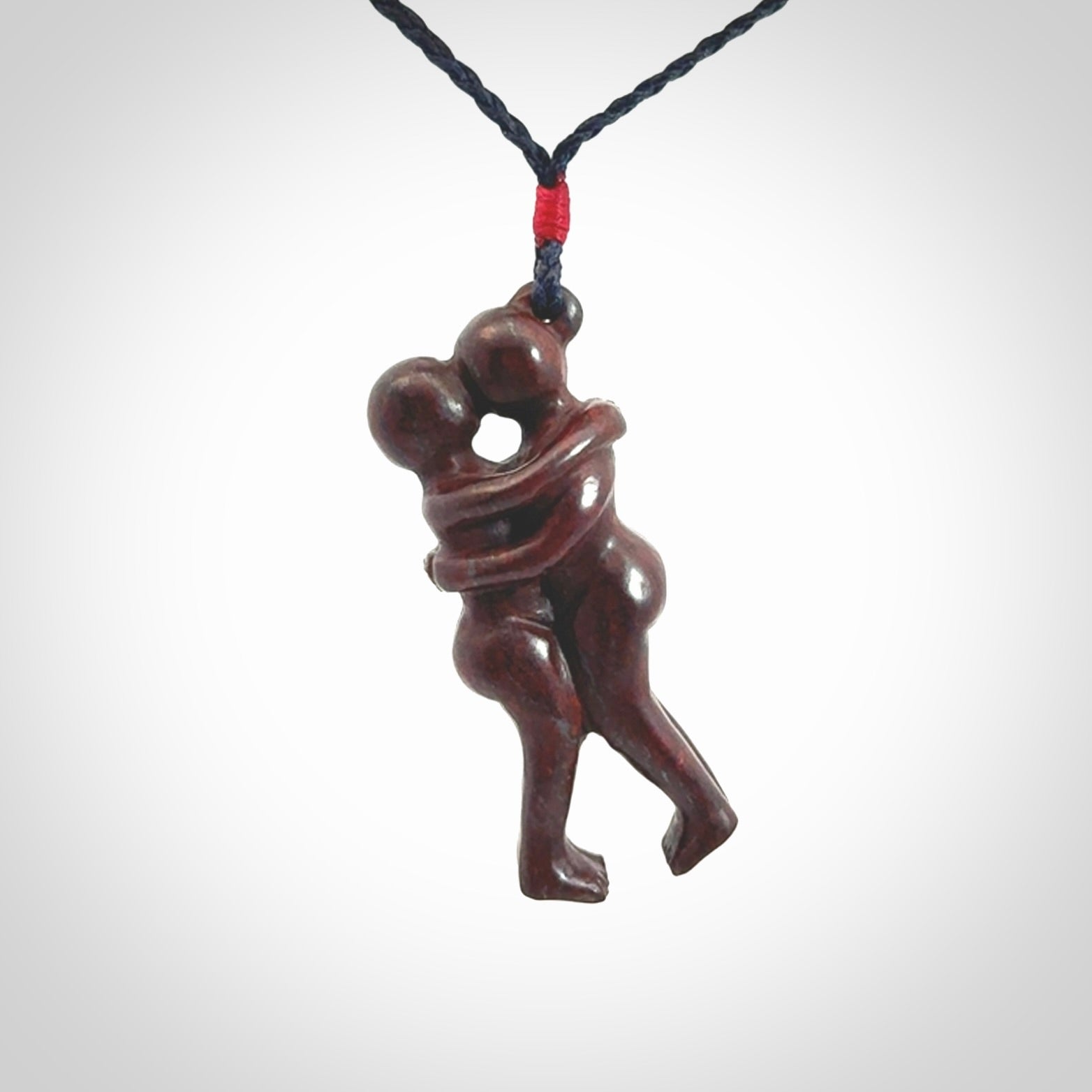 Hand carved Jasper hugging couple pendant