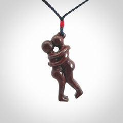 Hand carved Jasper hugging couple pendant