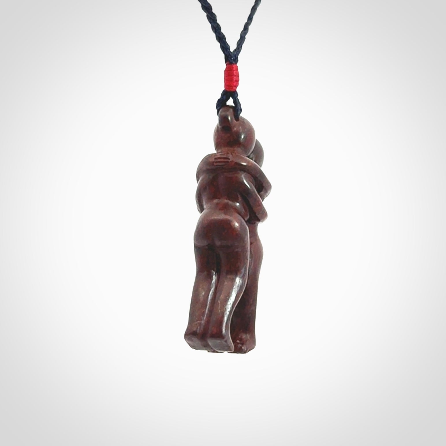 Hand carved Jasper hugging couple pendant