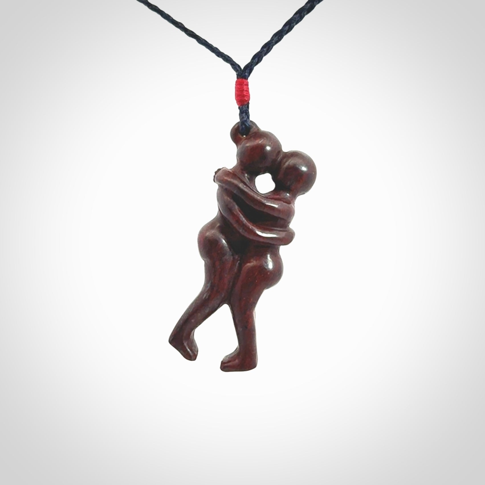 Hand carved Jasper hugging couple pendant