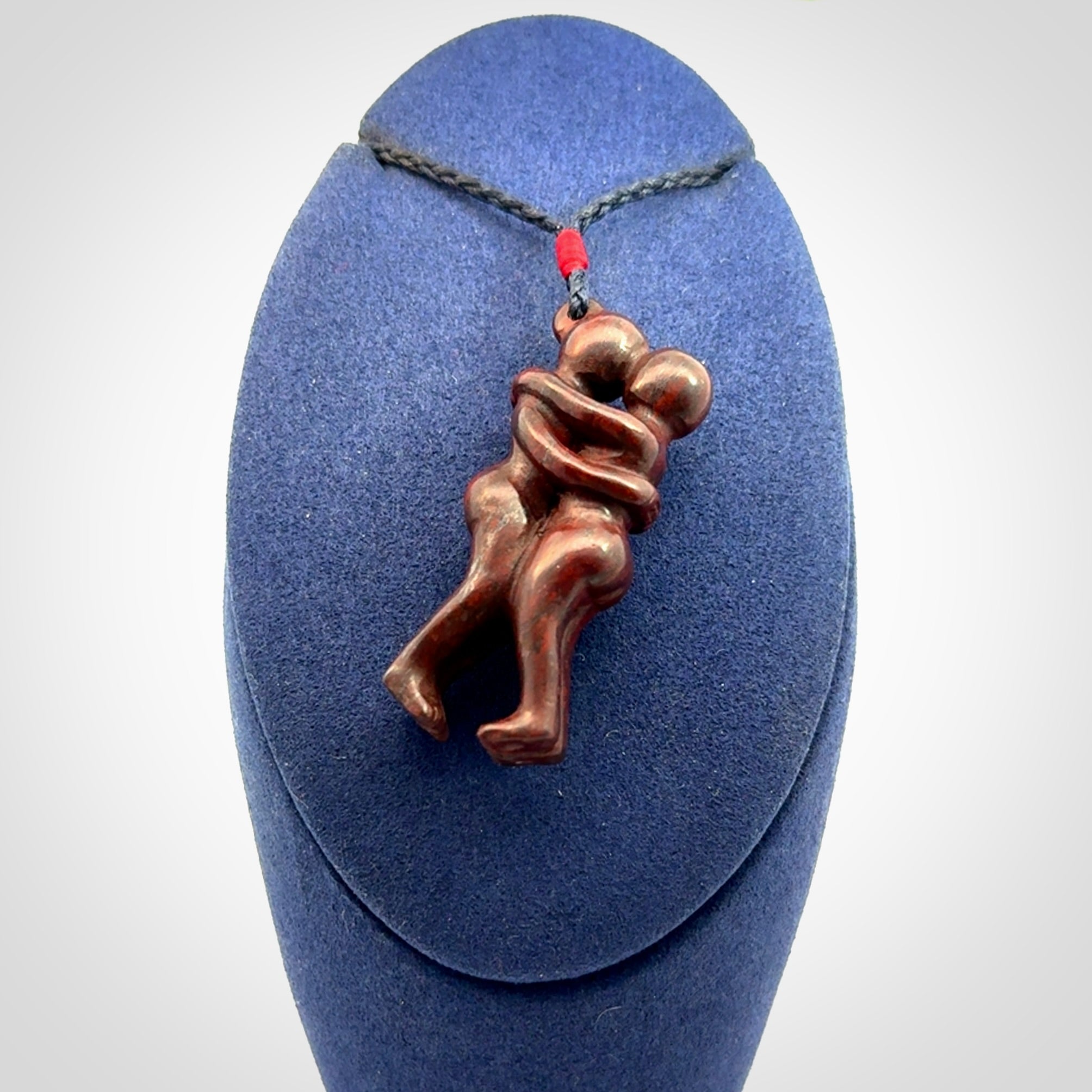 Hand carved Jasper hugging couple pendant