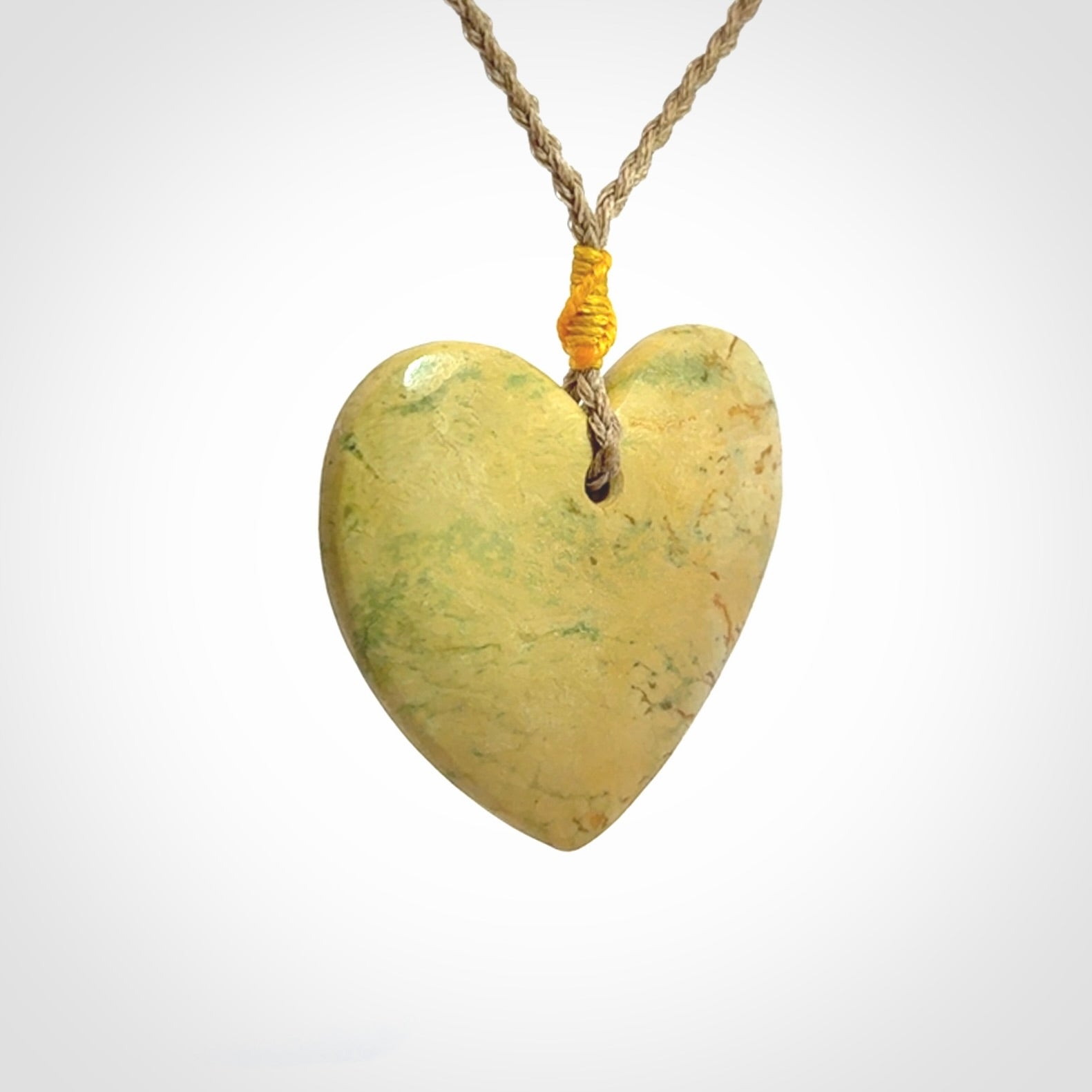 Hand carved New Zealand Flower Jade heart pendant