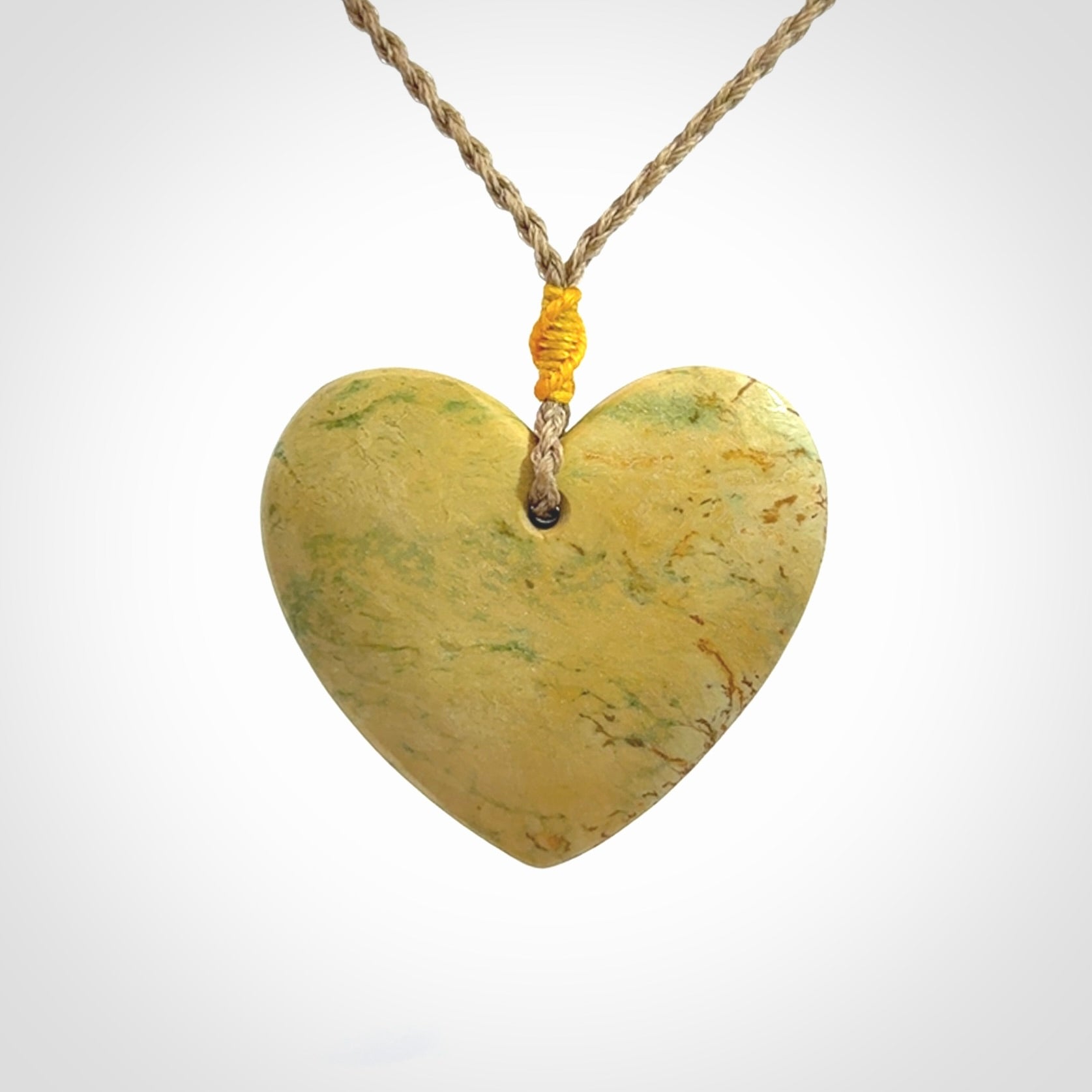 Hand carved New Zealand Flower Jade heart pendant