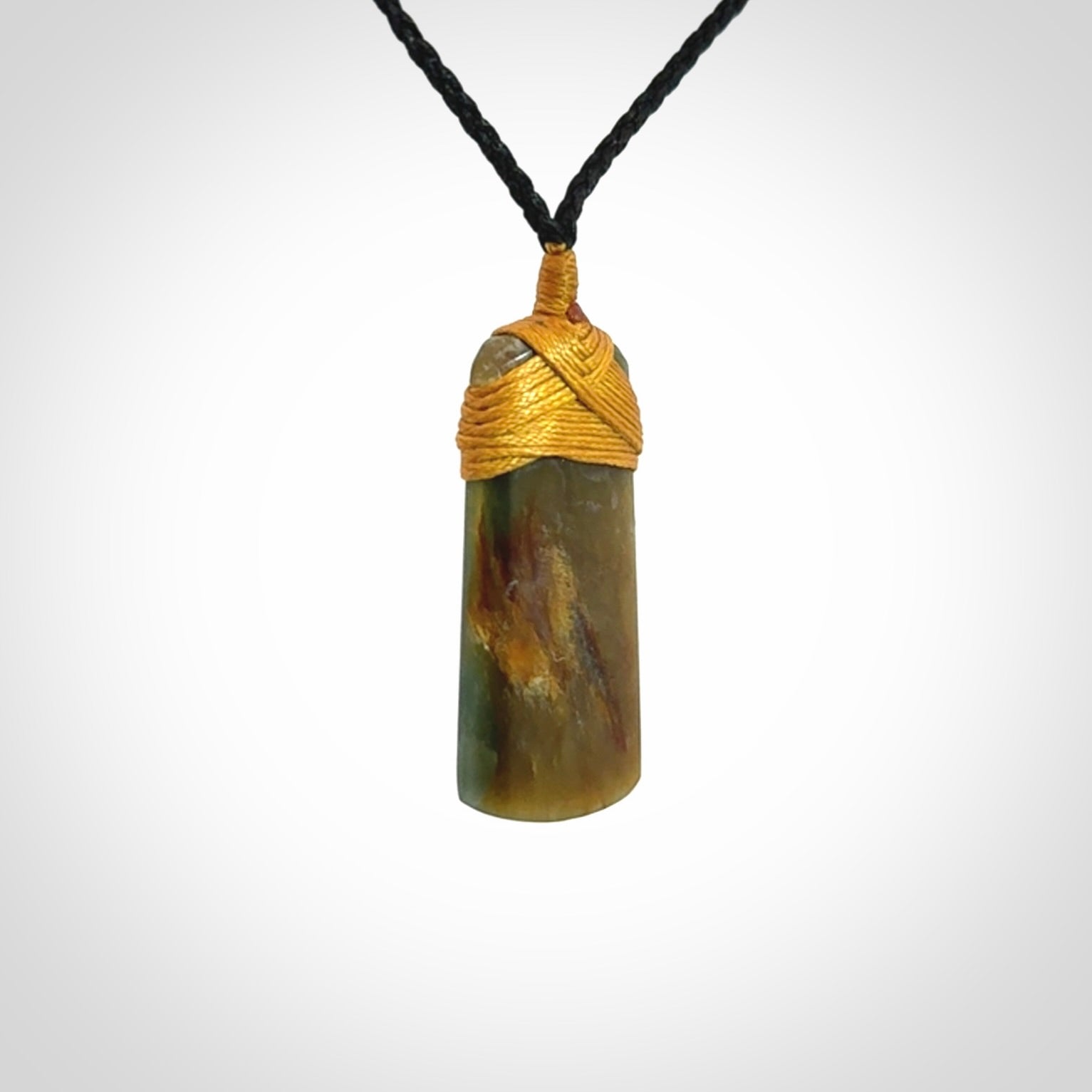 This beautiful toki pendant is carved in New Zealand Jade