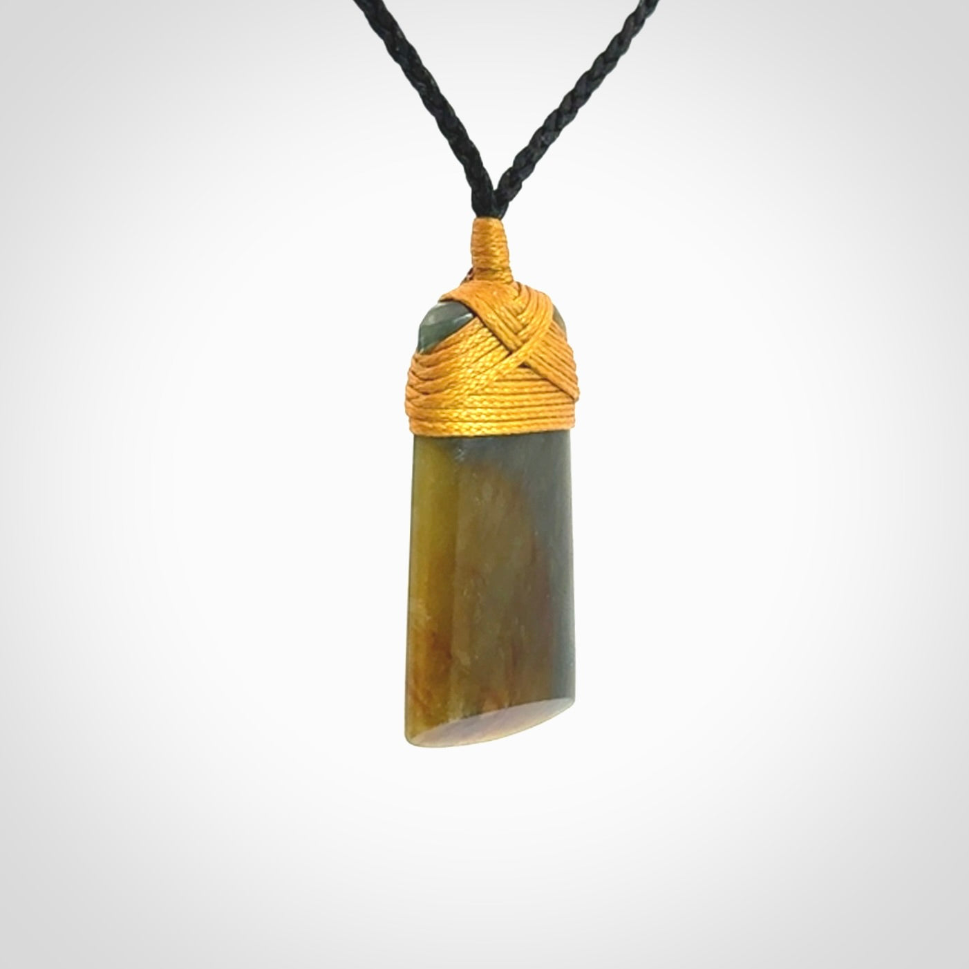 This beautiful toki pendant is carved in New Zealand Jade