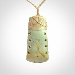 A Wonderful Notched Toki Carved in Flower Jade