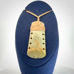 A Wonderful Notched Toki Carved in Flower Jade