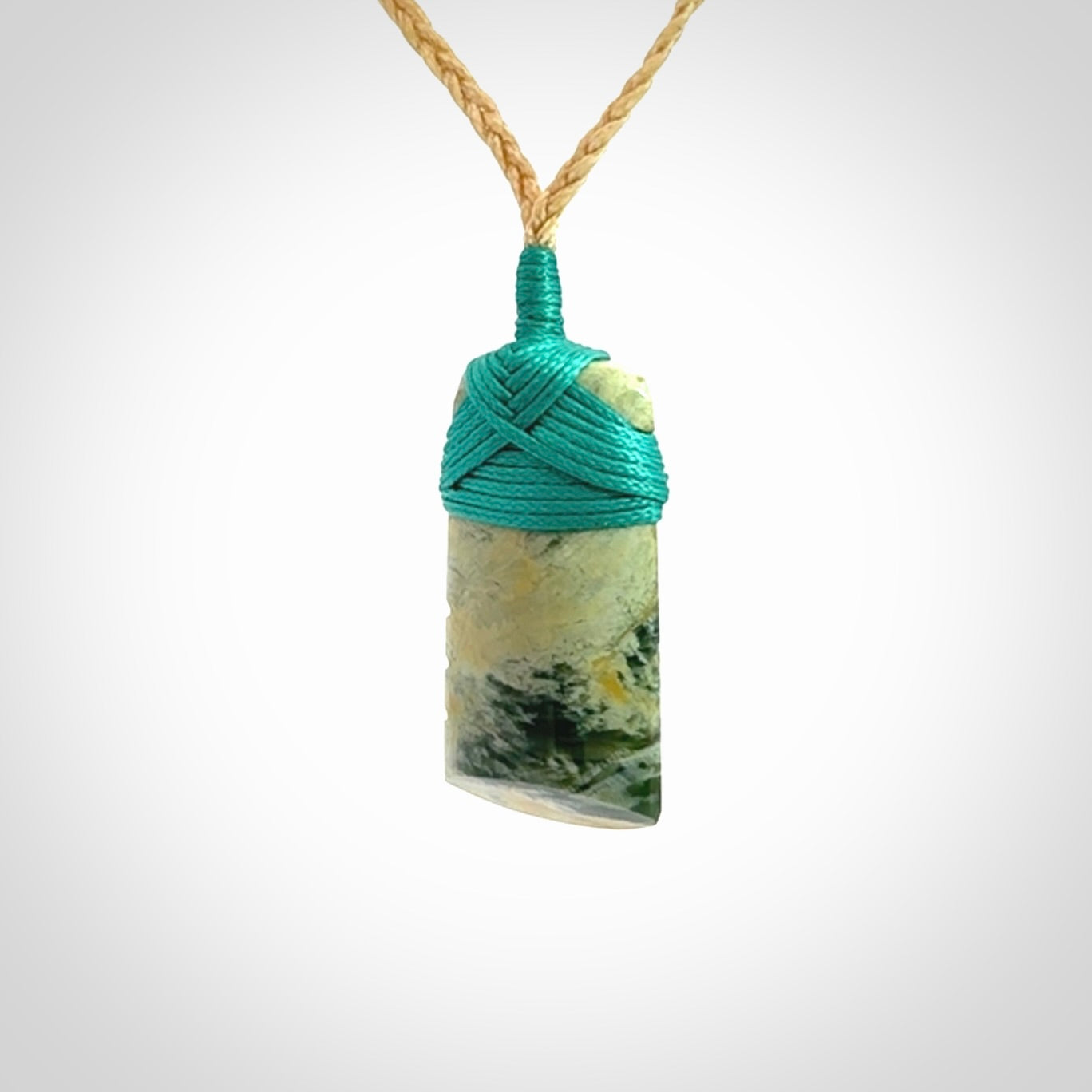 Hand carved New Zealand Flower Jade Toki pendant