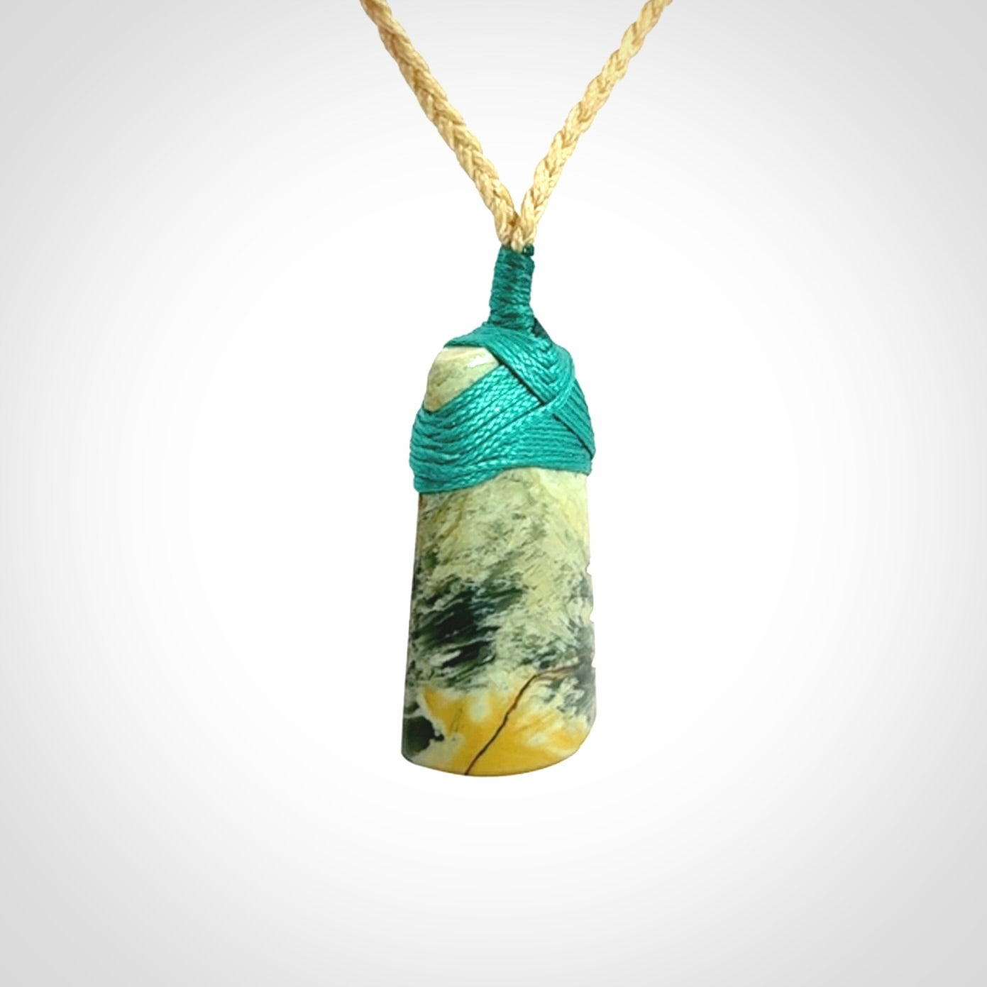 Hand carved New Zealand Flower Jade Toki pendant