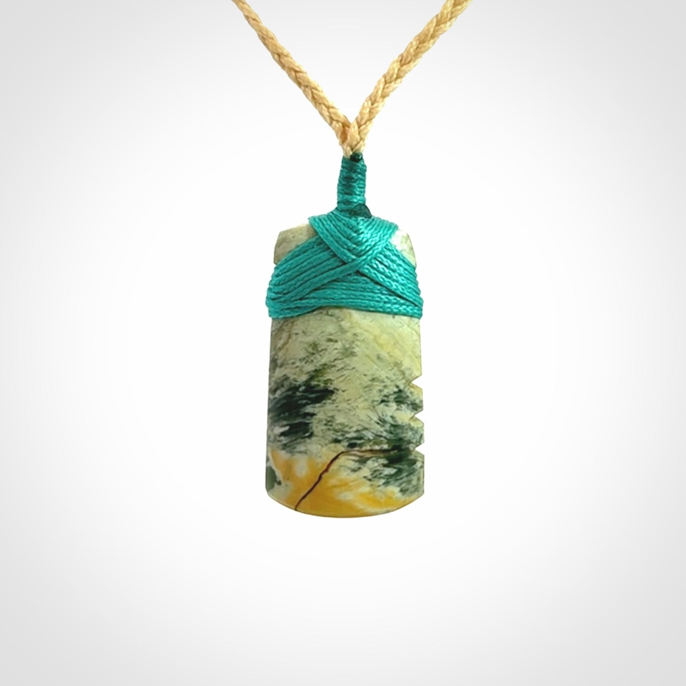 Hand carved New Zealand Flower Jade Toki pendant