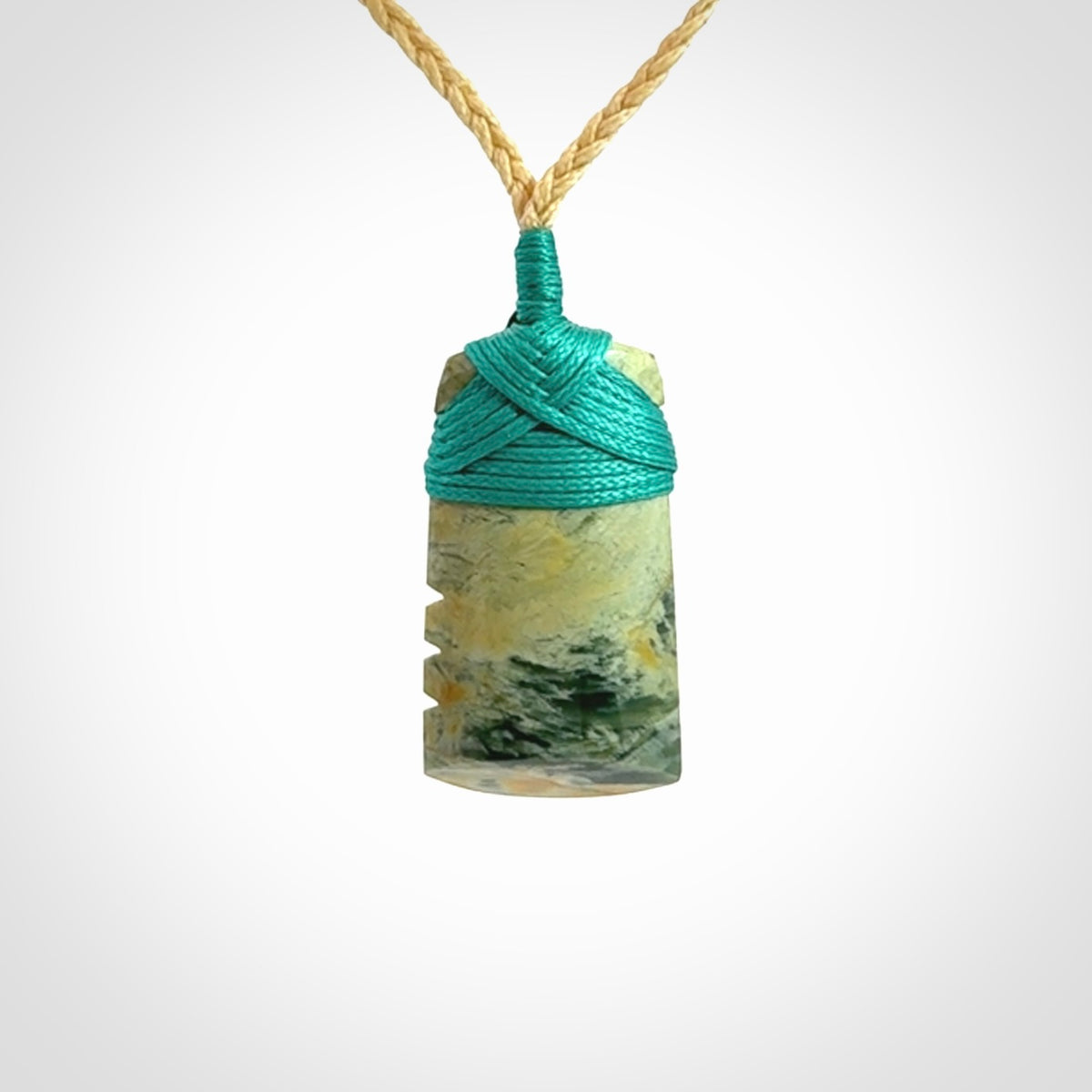 Hand carved New Zealand Flower Jade Toki pendant