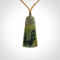 A gorgeous flower jade toki pendant
